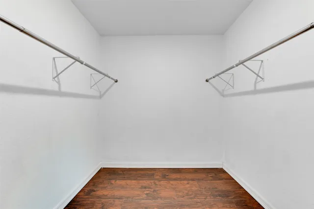 a view of a room with racks on the wall