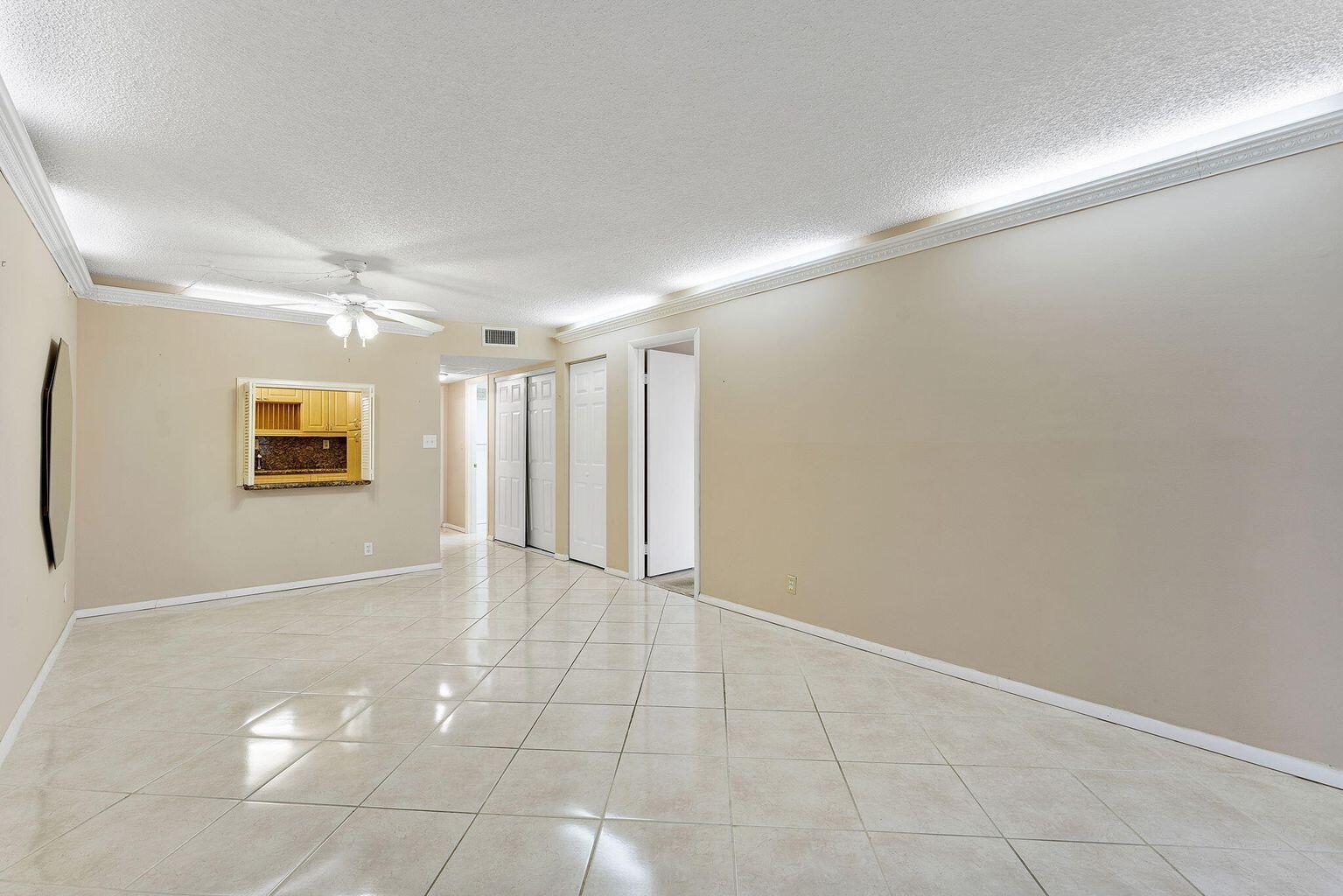9440 Southwest 8th Street, Unit 318 Boca Raton, FL 33428 - Photo 5 of 11 a view of an empty room