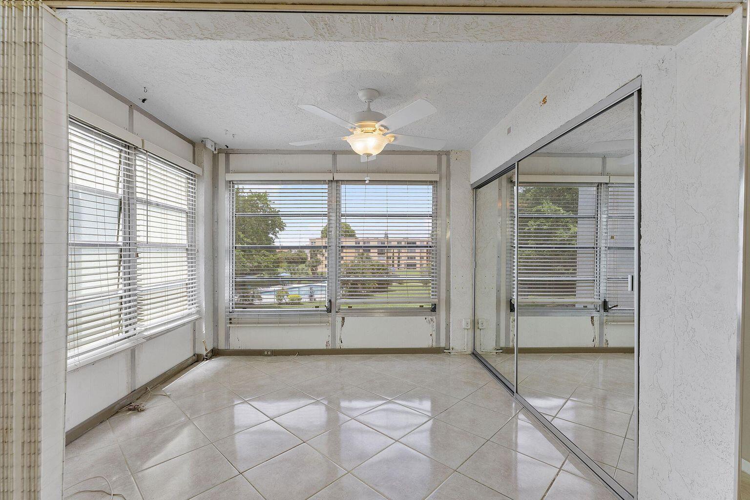 9440 Southwest 8th Street, Unit 318 Boca Raton, FL 33428 - Photo 10 of 11 a room with natural light and window