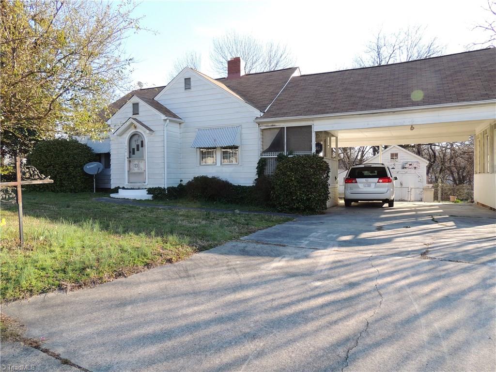 205 Lansdowne Street High Point, NC 27262 - Photo 1 of 16 Front of home with 2 car carport