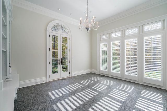 a view of a room with windows