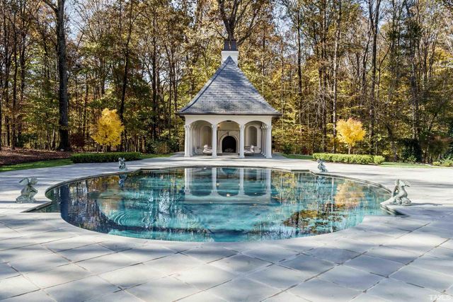 a view of outdoor space yard and swimming pool
