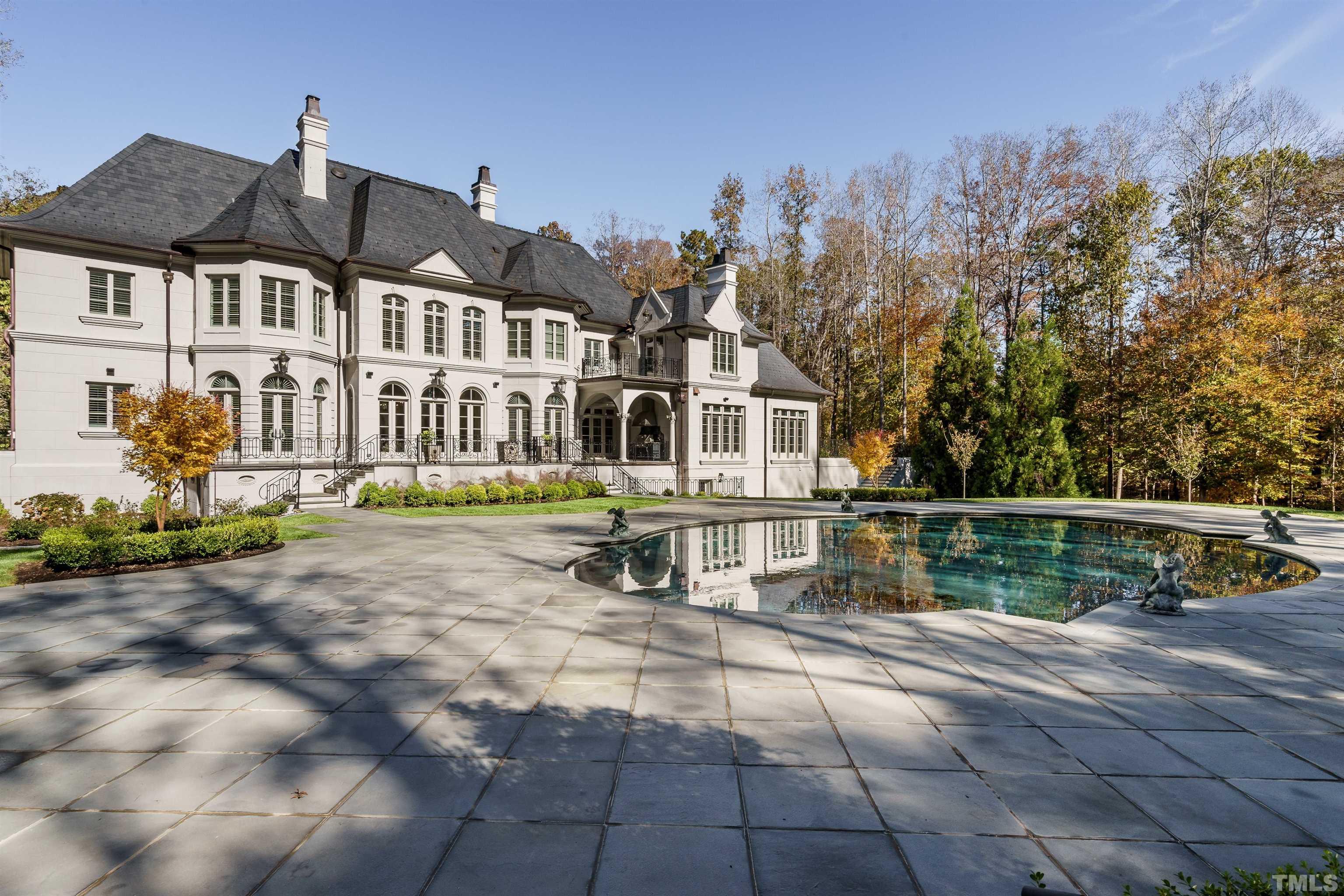 1624 Morning Mountain Road Raleigh, NC 27614 - Photo 29 of 30 a front view of a house with a garden