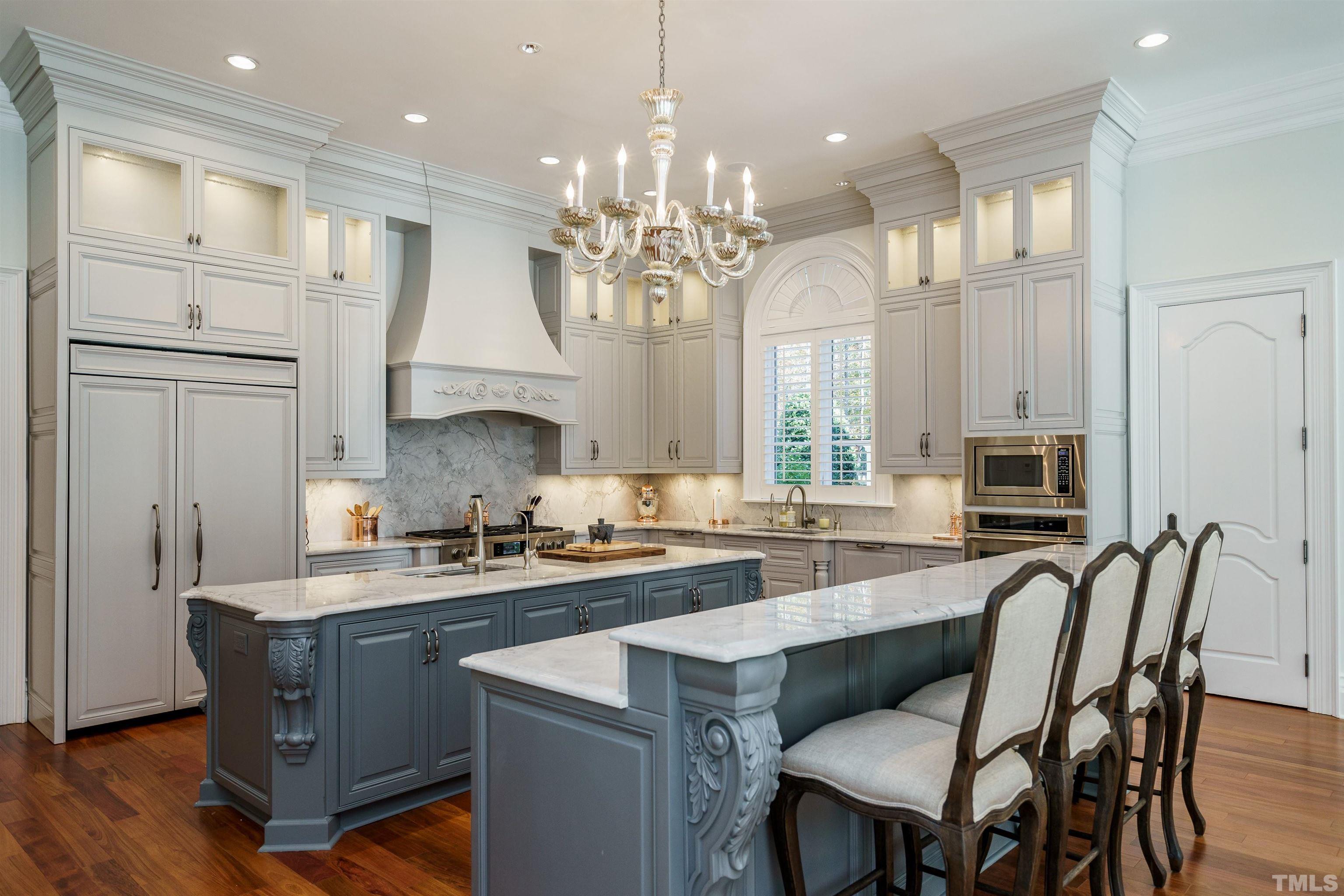 1624 Morning Mountain Road Raleigh, NC 27614 - Photo 9 of 30 a kitchen with granite countertop a center island a sink stainless steel appliances and cabinets