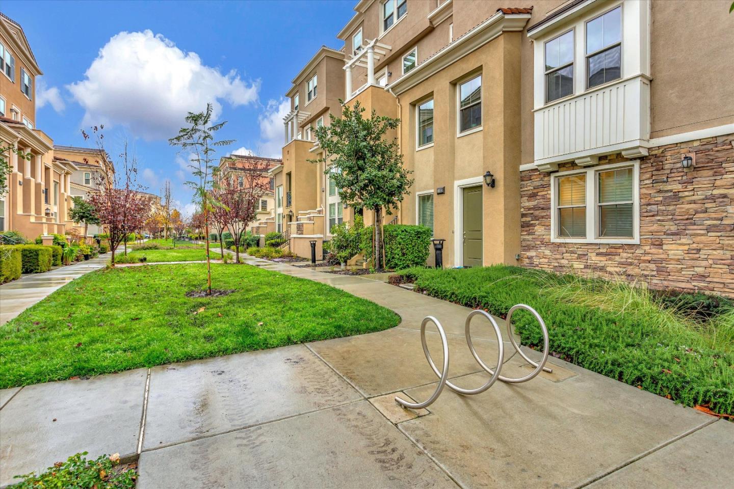 a view of a chair and table in the garden