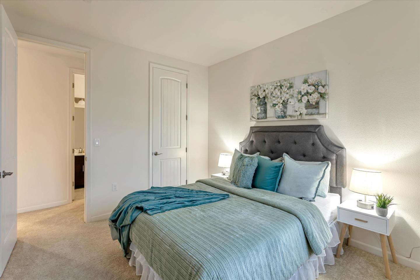 1886 Trento Loop Milpitas, CA 95035 - Photo 12 of 43 a bedroom with bed and cupboard