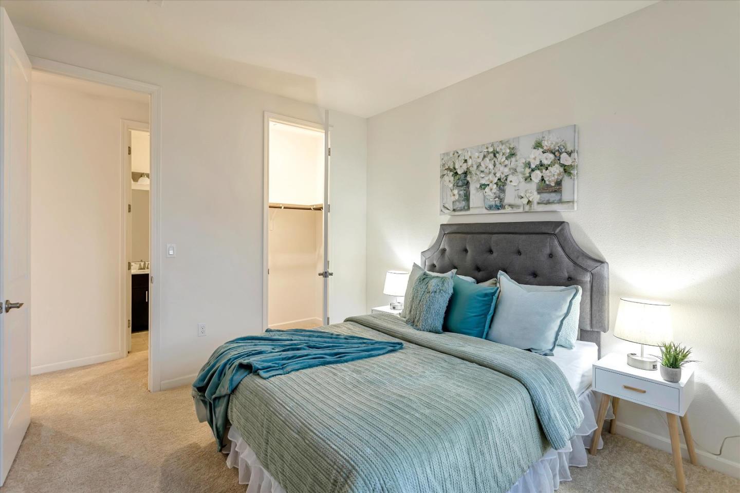 1886 Trento Loop Milpitas, CA 95035 - Photo 13 of 43 a bedroom with bed and wall painting