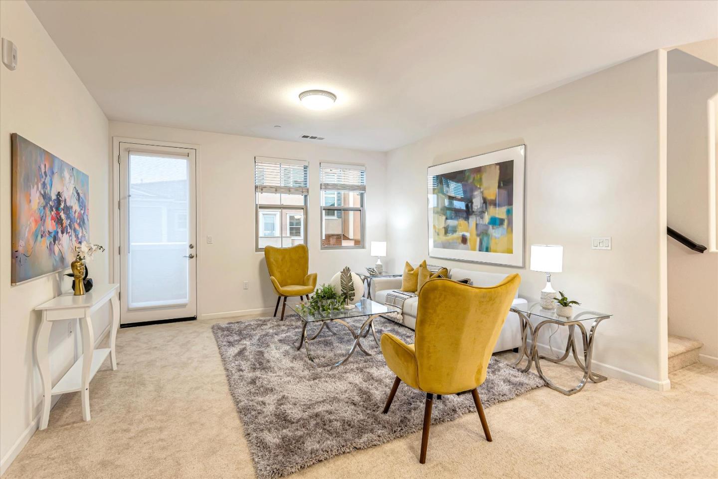 1886 Trento Loop Milpitas, CA 95035 - Photo 2 of 43 a living room with furniture and a painting on the wall