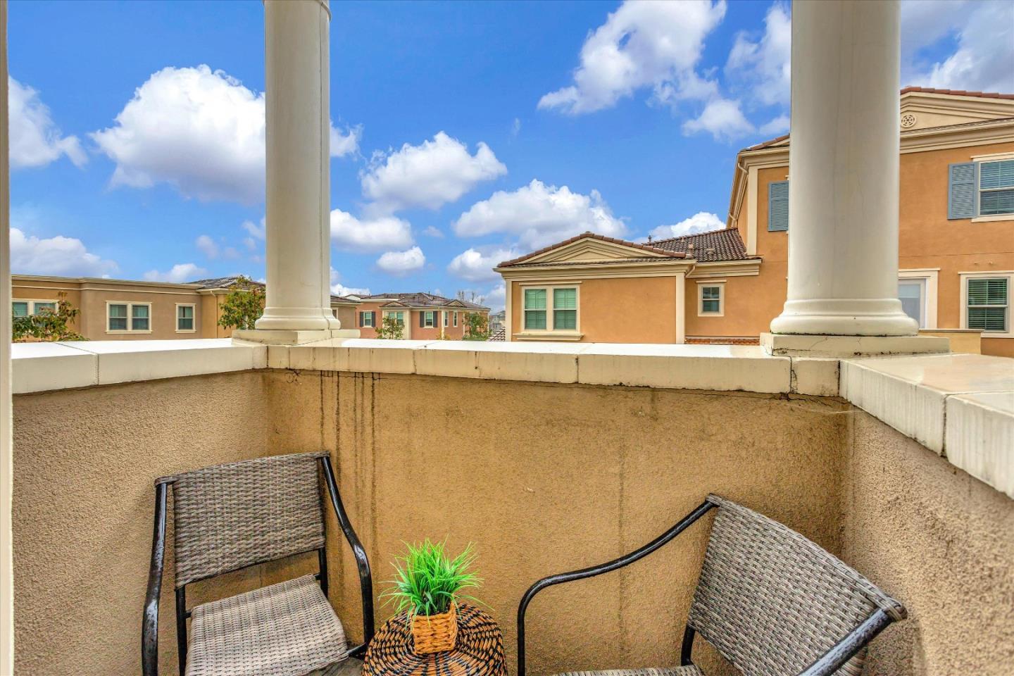 1886 Trento Loop Milpitas, CA 95035 - Photo 29 of 43 a view of a chair and table in the balcony