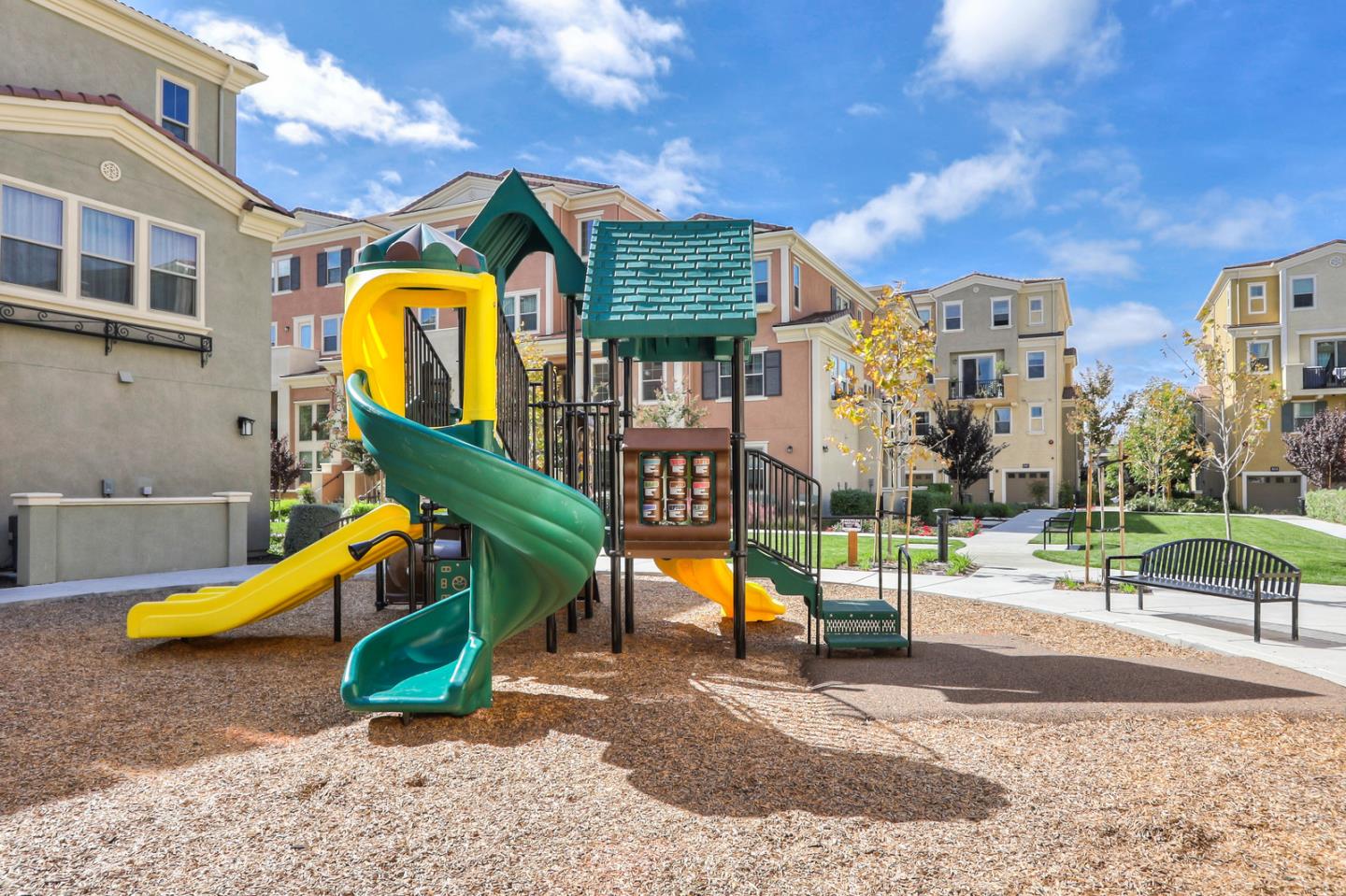 1886 Trento Loop Milpitas, CA 95035 - Photo 33 of 43 a view of a park with swings and slides
