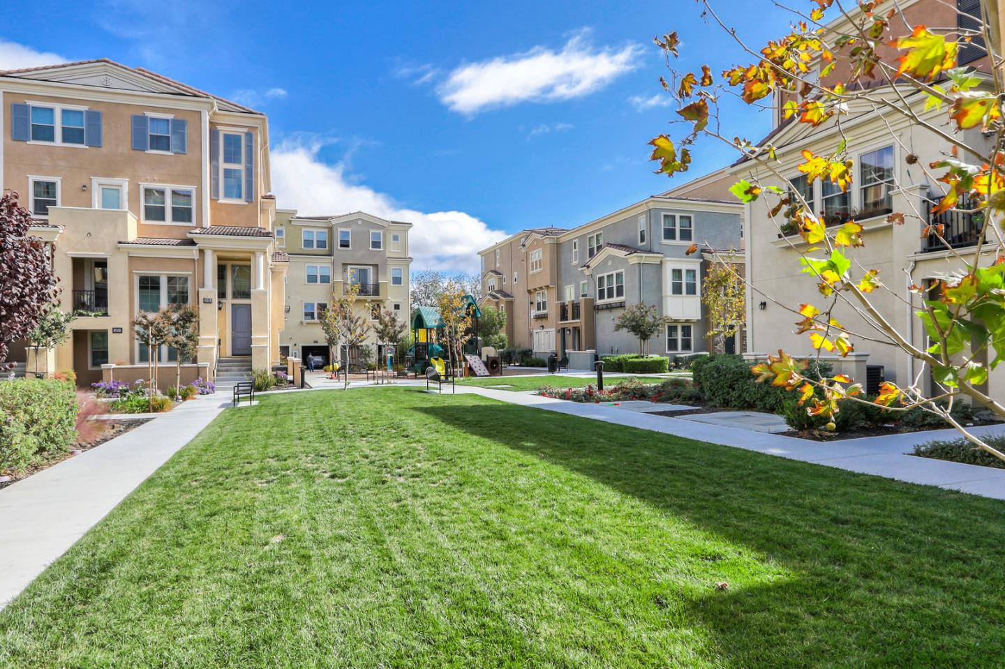 1886 Trento Loop Milpitas, CA 95035 - Photo 34 of 43 a view of a building with a yard