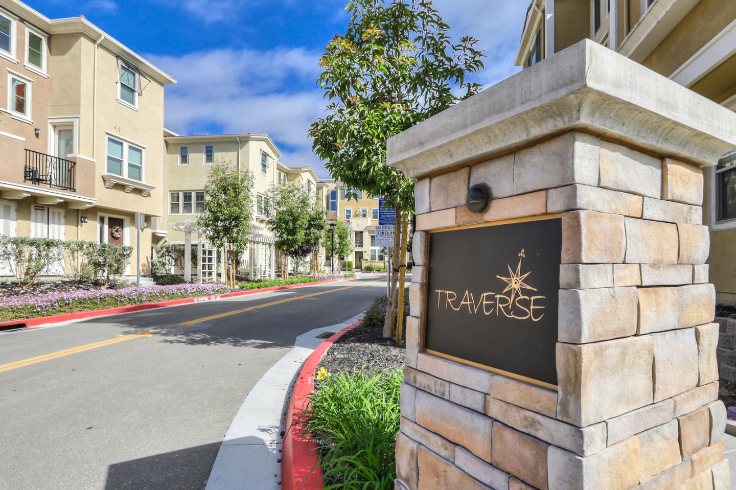 1886 Trento Loop Milpitas, CA 95035 - Photo 39 of 43 a sign on the side of a building