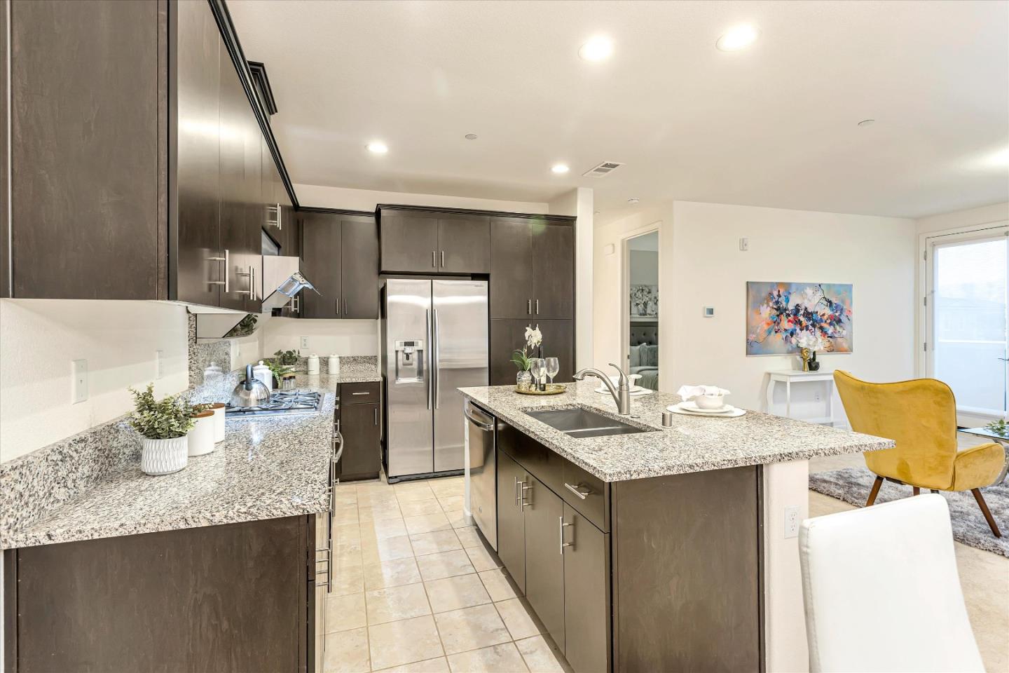 1886 Trento Loop Milpitas, CA 95035 - Photo 5 of 43 a kitchen with sink cabinets and refrigerator