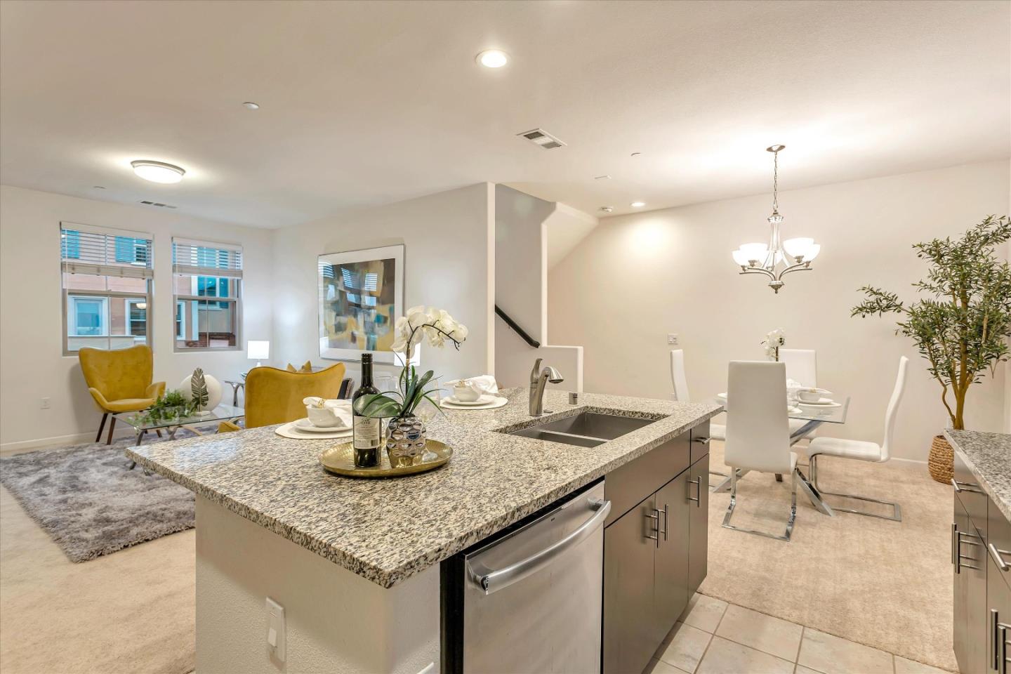 1886 Trento Loop Milpitas, CA 95035 - Photo 8 of 43 a kitchen with a counter space a sink and cabinets