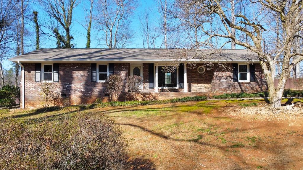 377 Macedonia Forest Circle Canton, GA 30115 - Photo 1 of 1 a front view of house with yard
