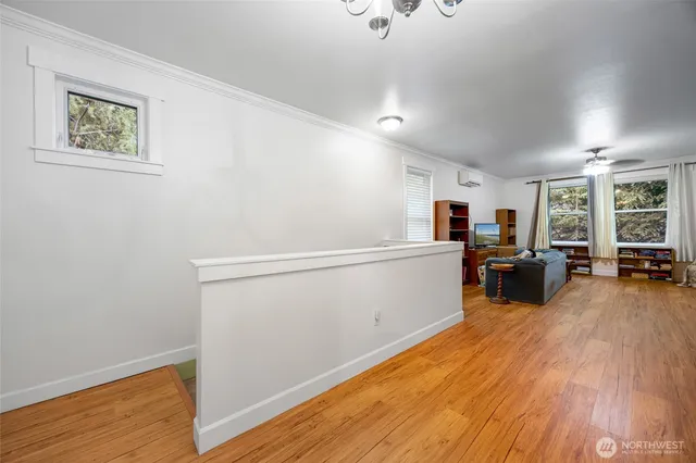 a room with furniture and a wooden floor