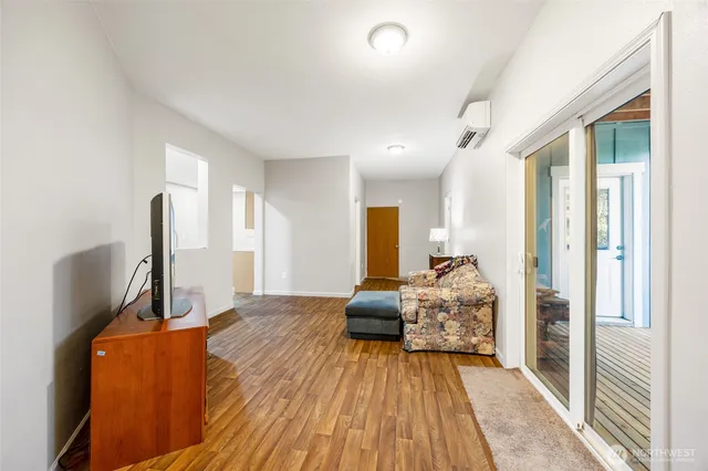 a reading room with furniture and book shelf