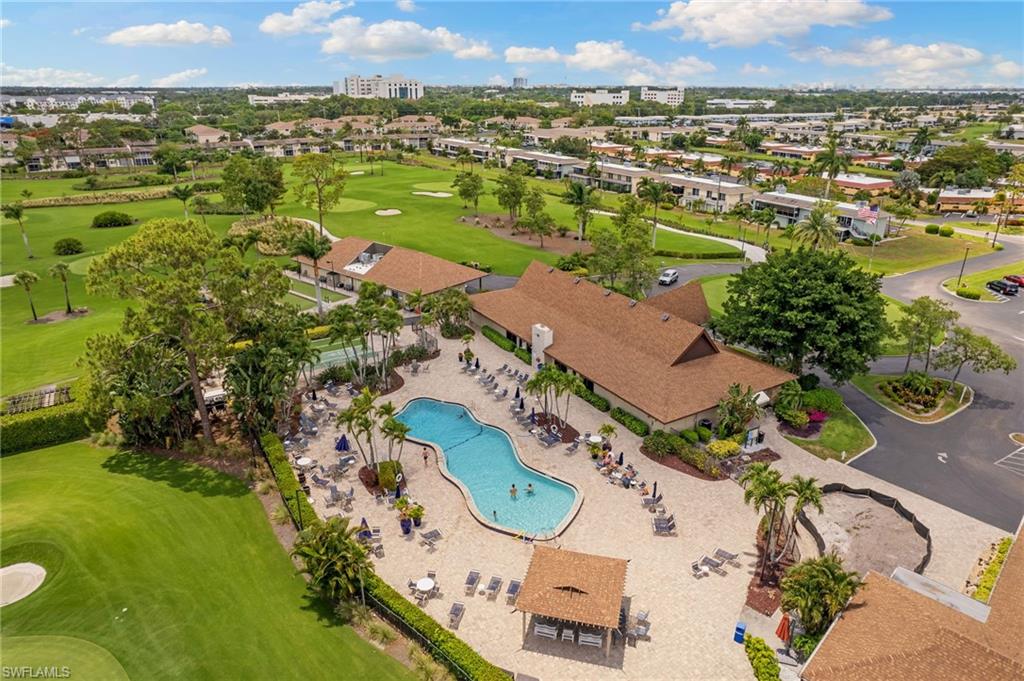 131 Teryl Road, Unit C3 Naples, FL 34112 - Photo 3 of 26 an aerial view of residential houses with outdoor space and street view