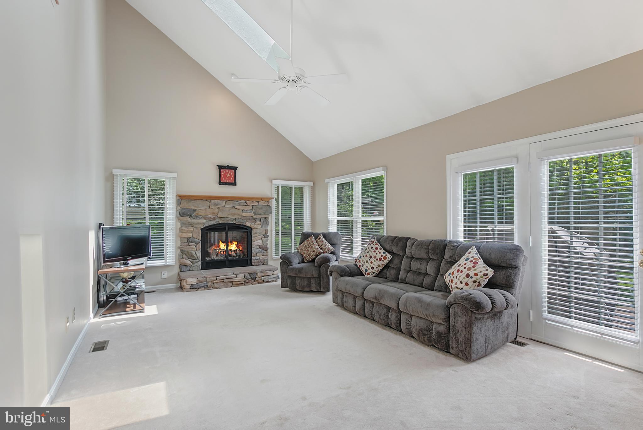 18832 Falling Star Road Germantown, MD 20874 - Photo 11 of 42 FAMILY ROOM WITH STONE FIREPLACE
