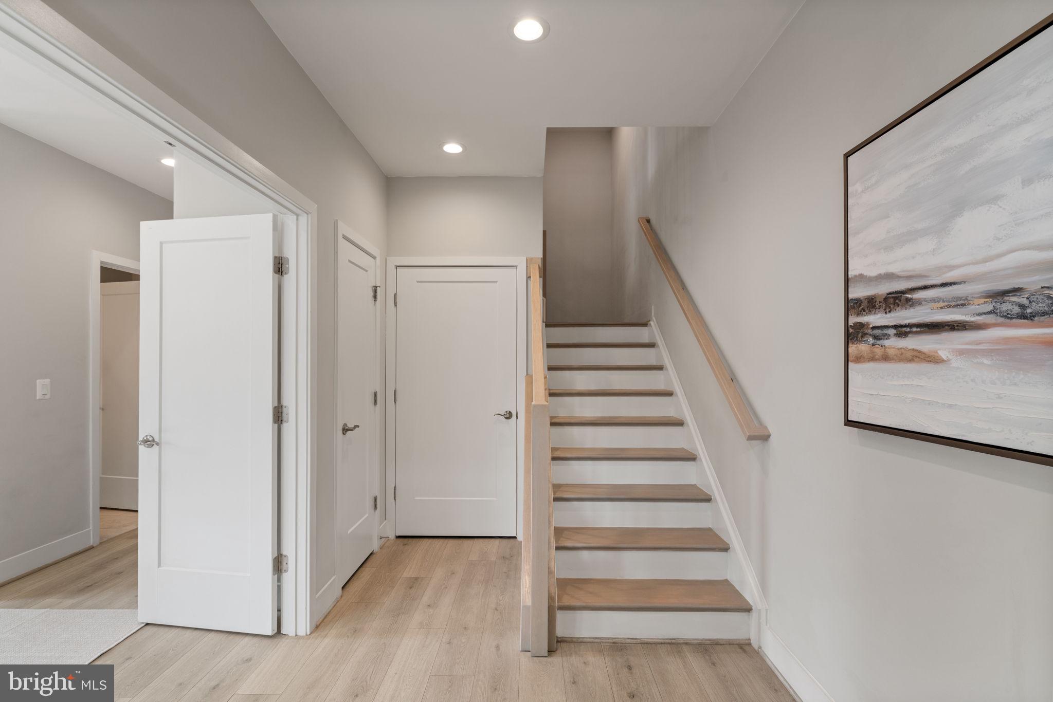 3006 Eskridge Road Fairfax, VA 22031 - Photo 31 of 41 a view of entryway with wooden floor and stairs