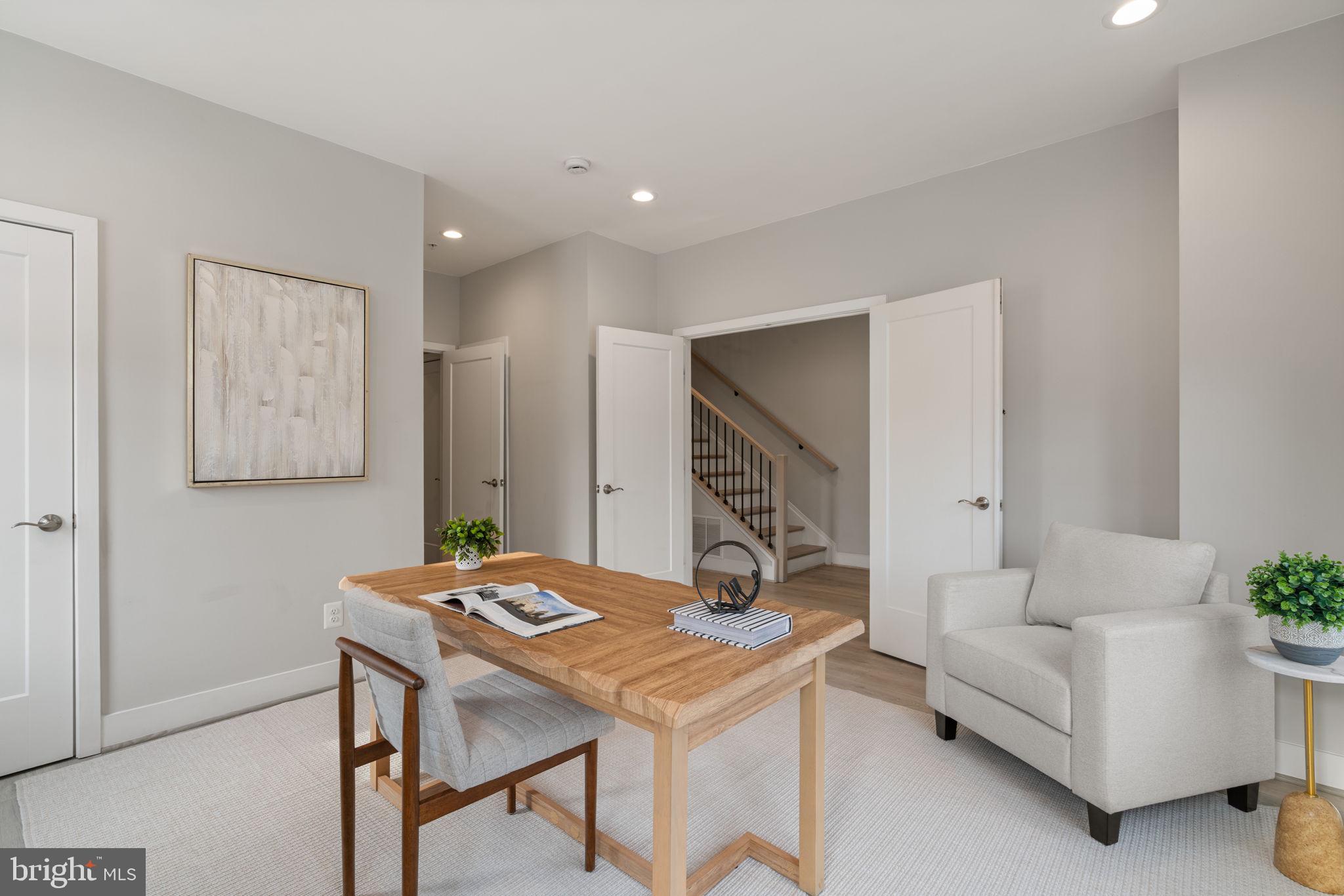3006 Eskridge Road Fairfax, VA 22031 - Photo 32 of 41 a living room with furniture and a table