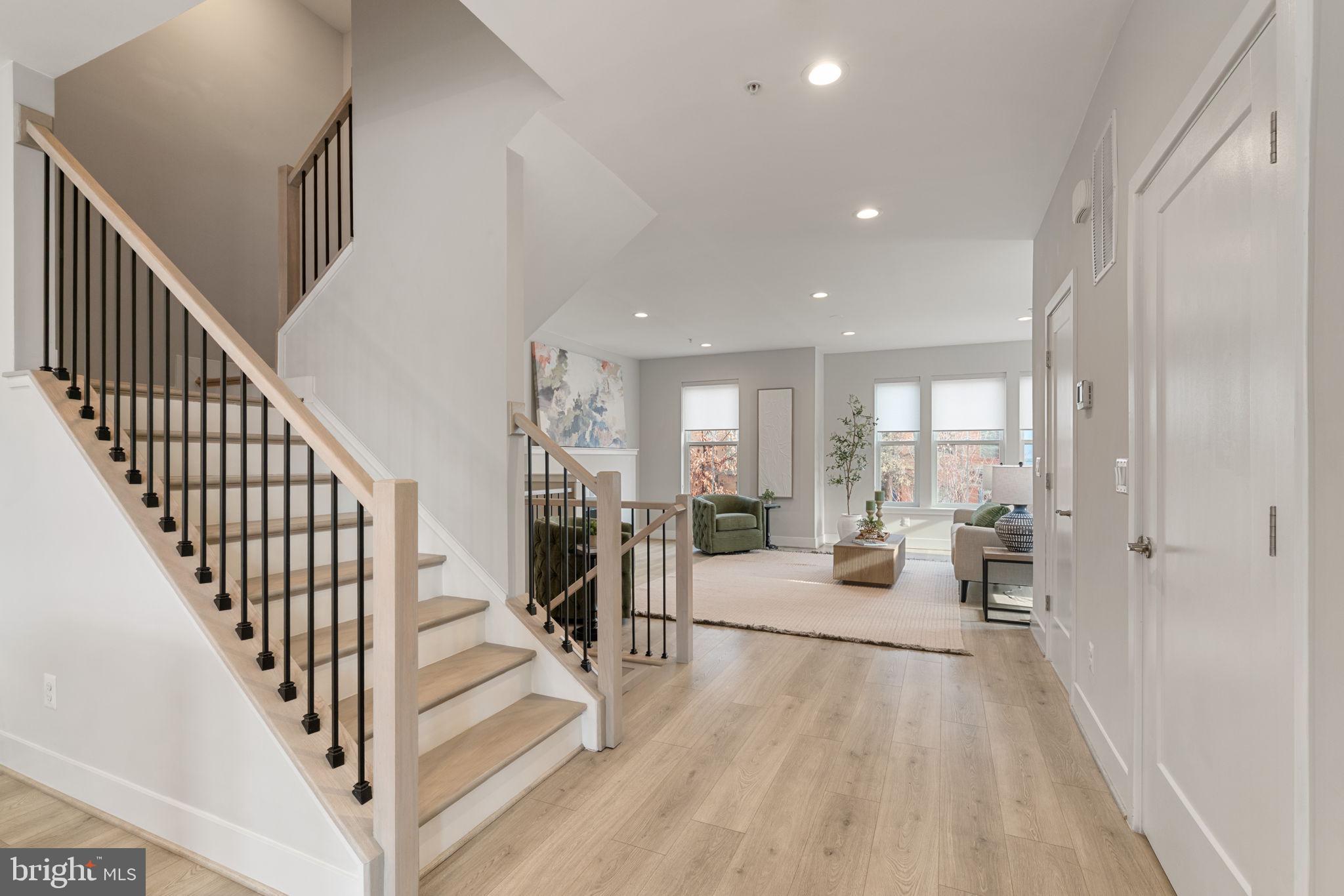 3006 Eskridge Road Fairfax, VA 22031 - Photo 35 of 41 a view of a livingroom with furniture wooden floor and windows