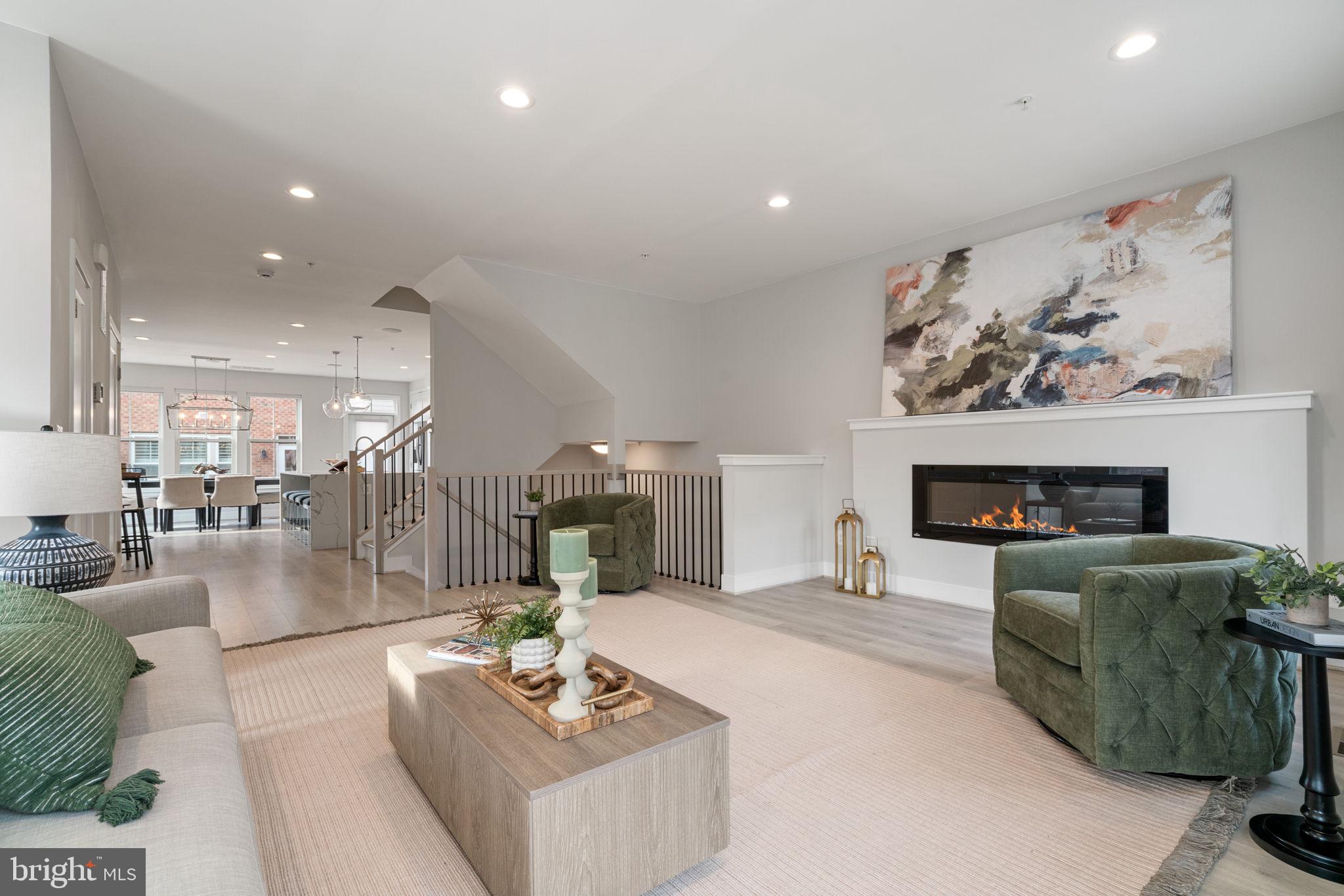 3006 Eskridge Road Fairfax, VA 22031 - Photo 36 of 41 a living room with furniture and a fireplace