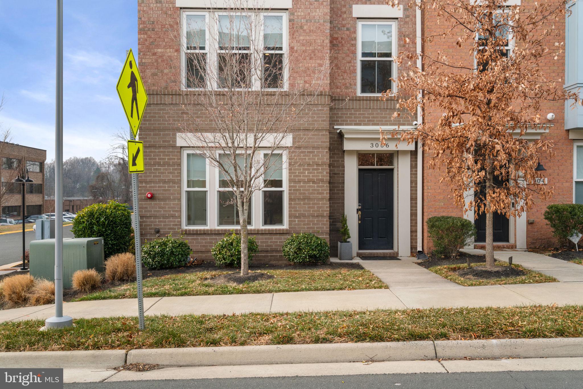 3006 Eskridge Road Fairfax, VA 22031 - Photo 41 of 41 a front view of a building with garden