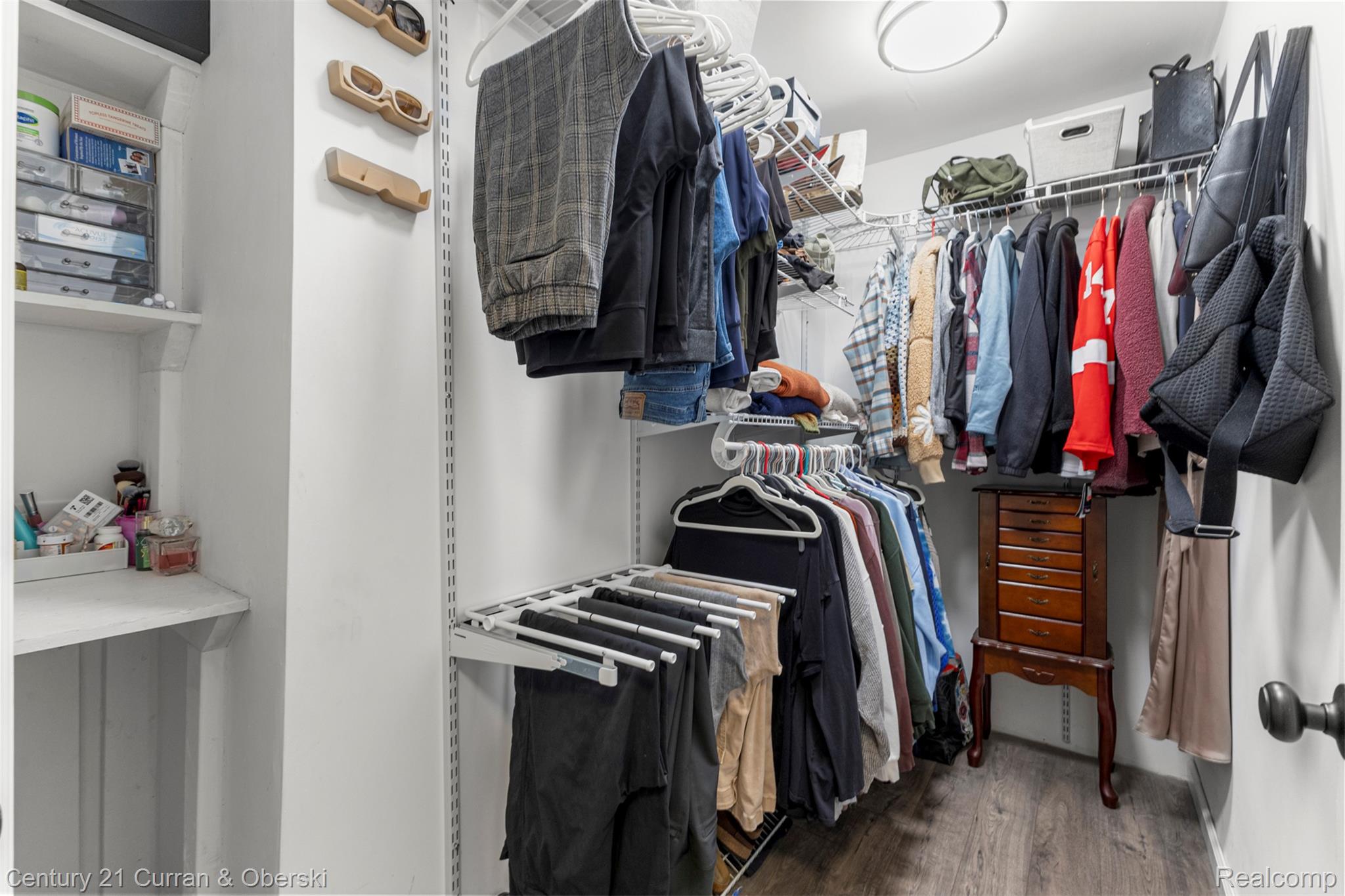 9329 Merriman Road Livonia, MI 48150 - Photo 16 of 32 Walk in closet with wood finished floors