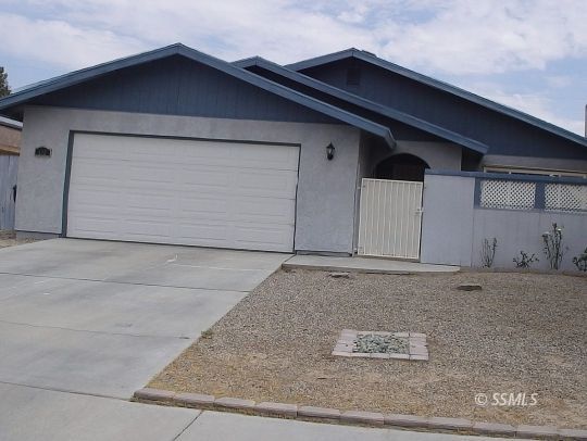 412 North Mono Street Ridgecrest, CA 93555 - Photo 1 of 50 a front view of a house