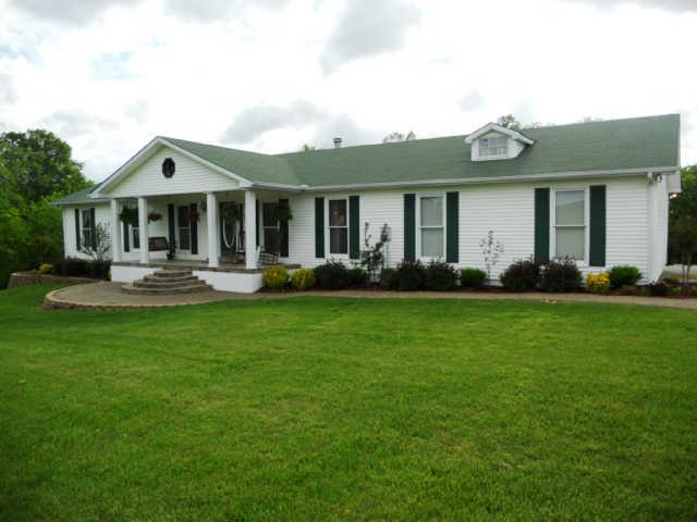 2778 Battle Creek Road Springfield, TN 37172 - Photo 1 of 20 a front view of a house with a yard and trees