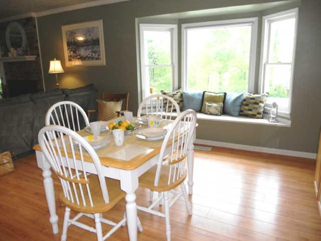 2778 Battle Creek Road Springfield, TN 37172 - Photo 11 of 20 a view of a dining room with furniture wooden floor and chandelier