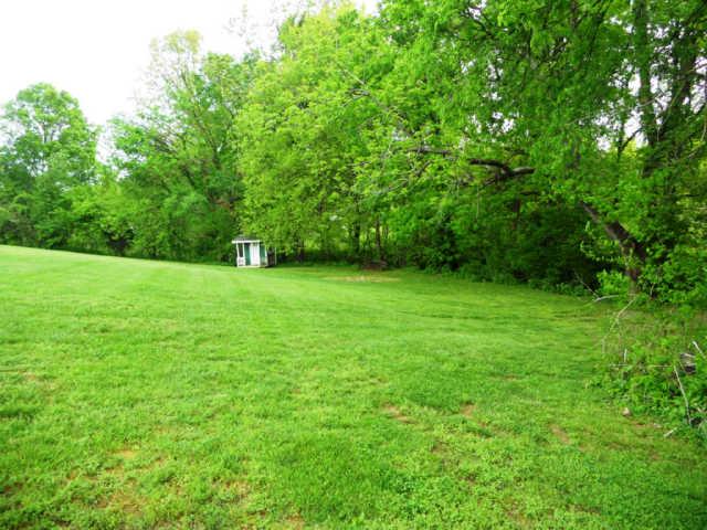 2778 Battle Creek Road Springfield, TN 37172 - Photo 19 of 20 a view of a green yard