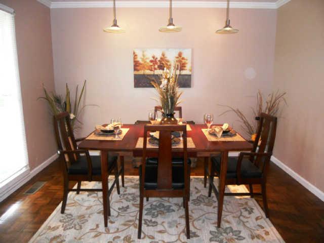 2778 Battle Creek Road Springfield, TN 37172 - Photo 5 of 20 a view of a dining room with furniture and wooden floor