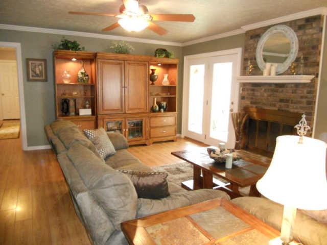 2778 Battle Creek Road Springfield, TN 37172 - Photo 6 of 20 a living room with furniture and a fireplace