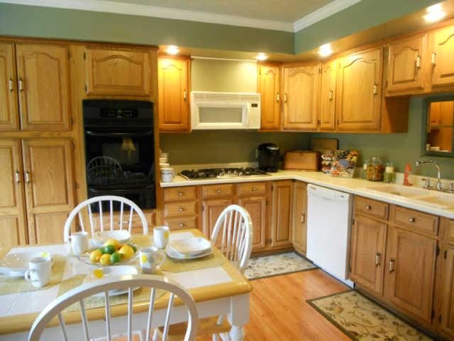2778 Battle Creek Road Springfield, TN 37172 - Photo 9 of 20 a kitchen with stainless steel appliances granite countertop a sink and cabinets