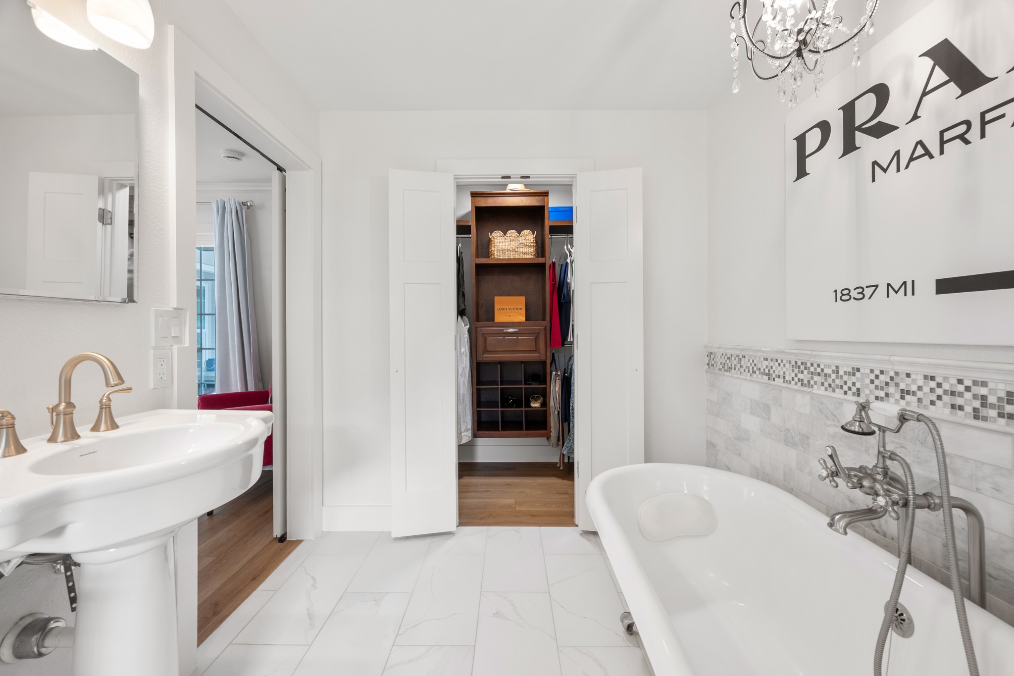 1811 Cando Court Lakeway, TX 78734 - Photo 20 of 40 View of walk-in closet in primary bathroom suite