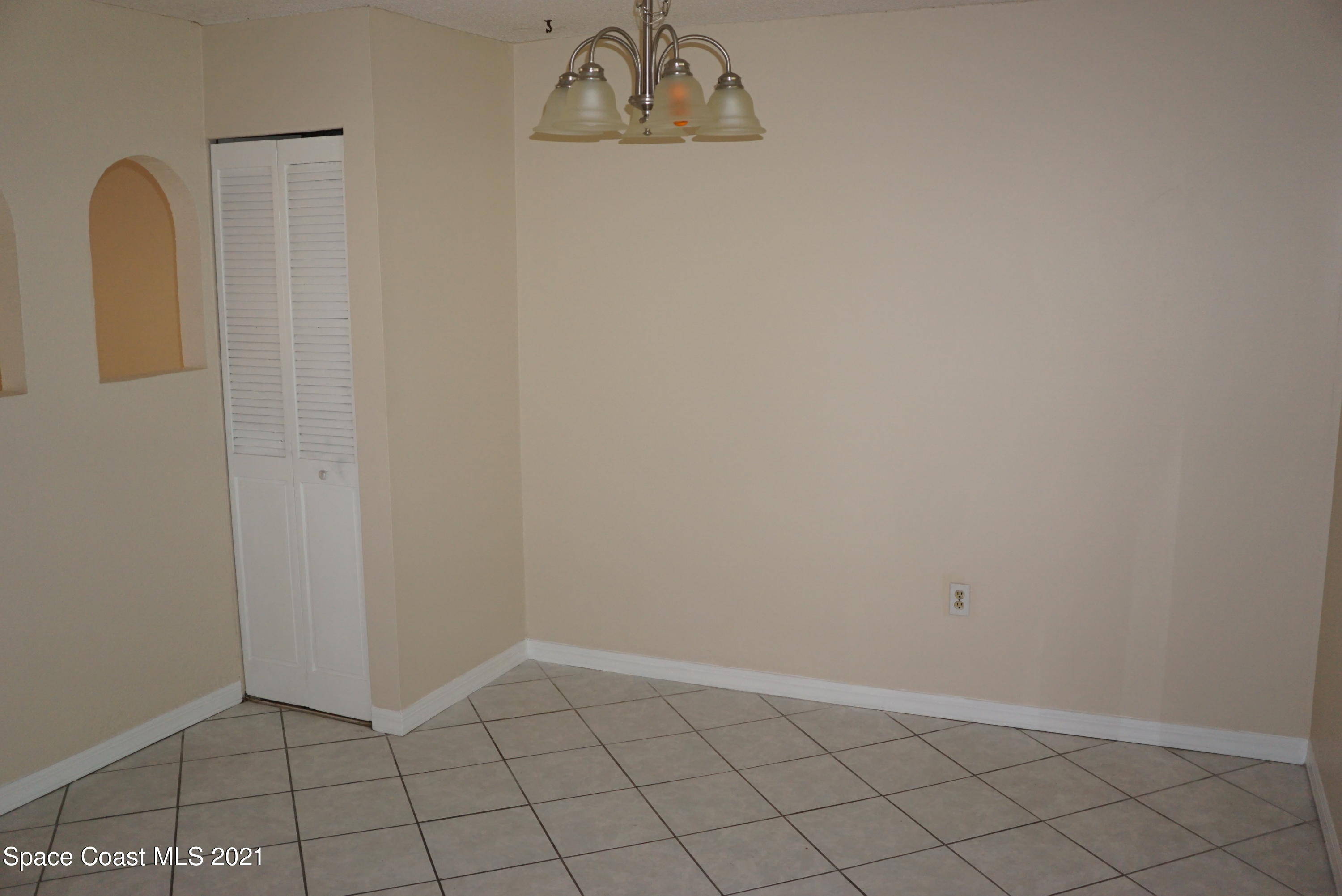 1052 Bernice Road Rockledge, FL 32955 - Photo 13 of 39 a view of a door in a room