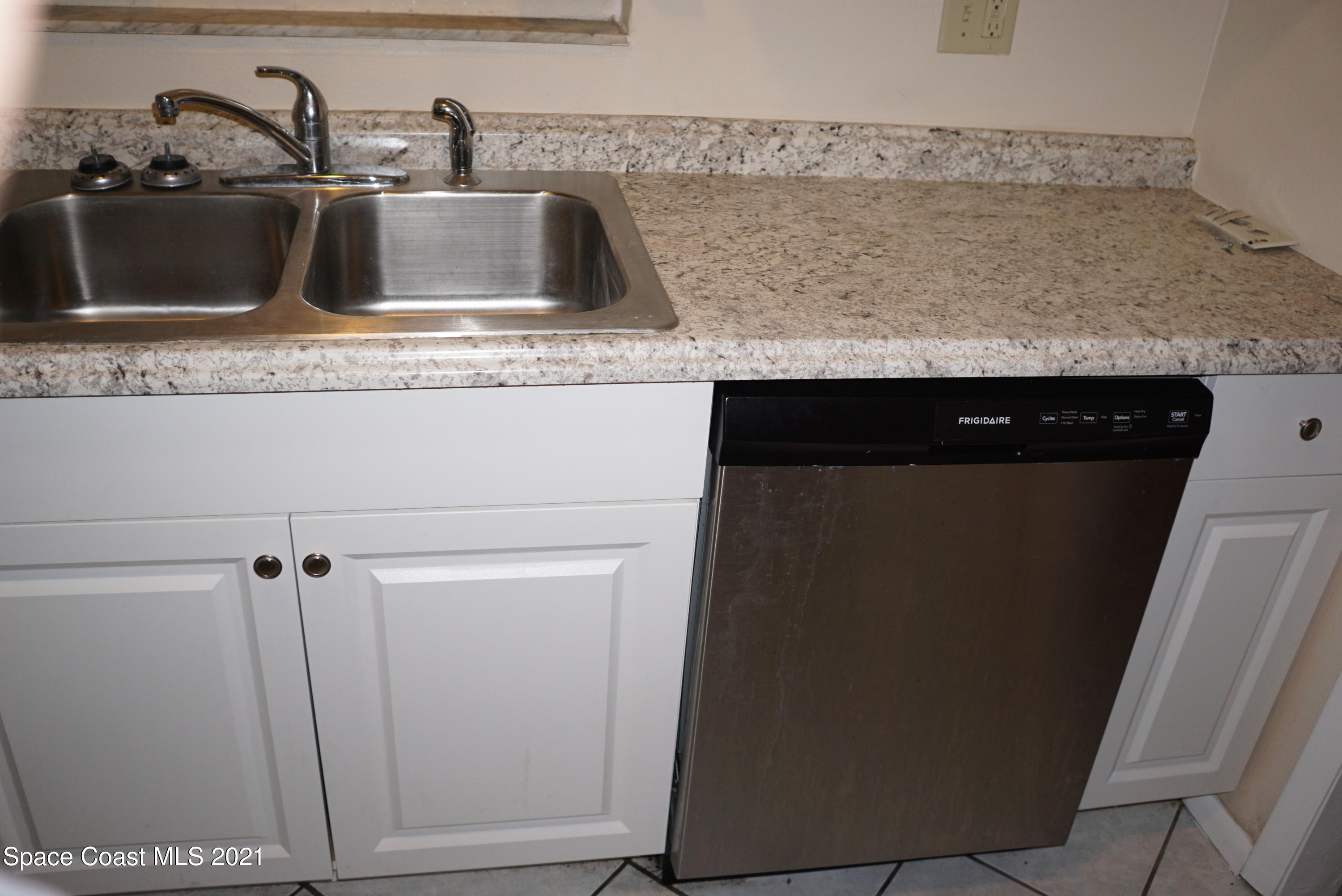 1052 Bernice Road Rockledge, FL 32955 - Photo 16 of 39 a close view of sink and tap