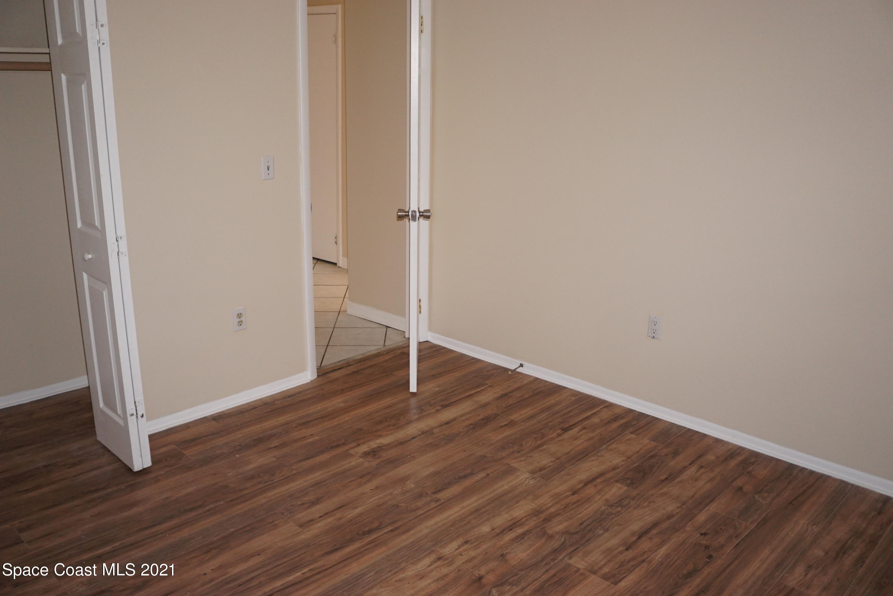 1052 Bernice Road Rockledge, FL 32955 - Photo 29 of 39 a view of wooden floor in an empty room