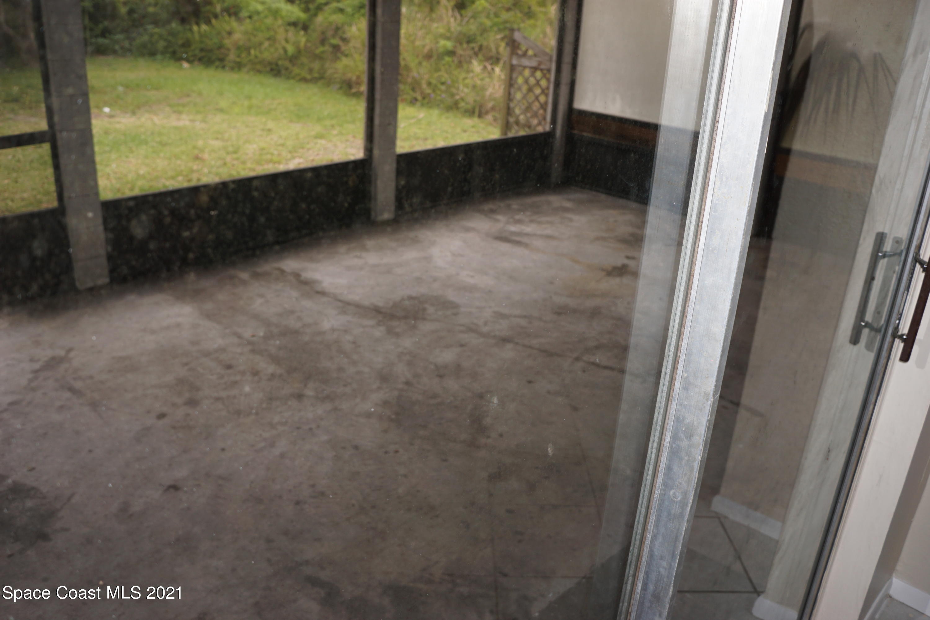 1052 Bernice Road Rockledge, FL 32955 - Photo 35 of 39 a view of an empty room and window