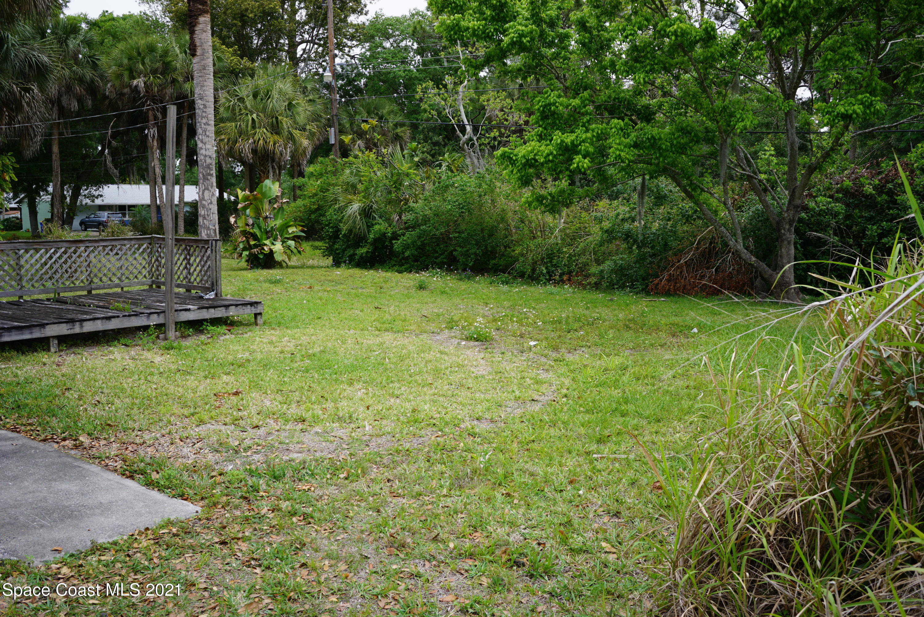 1052 Bernice Road Rockledge, FL 32955 - Photo 38 of 39 a view of a backyard with a garden