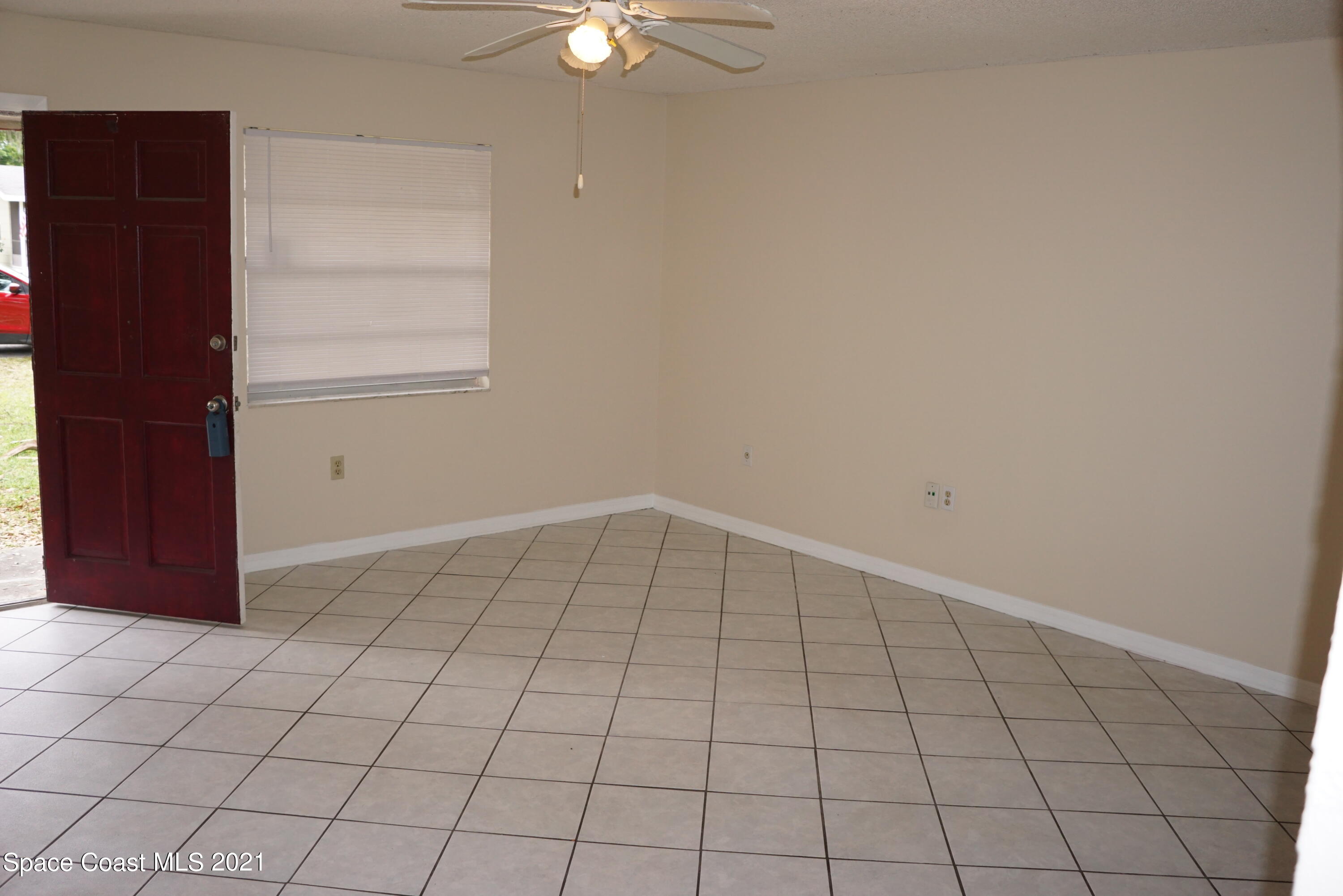 1052 Bernice Road Rockledge, FL 32955 - Photo 6 of 39 a view of an empty room