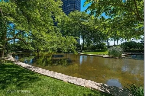 a view of a lake view with a garden