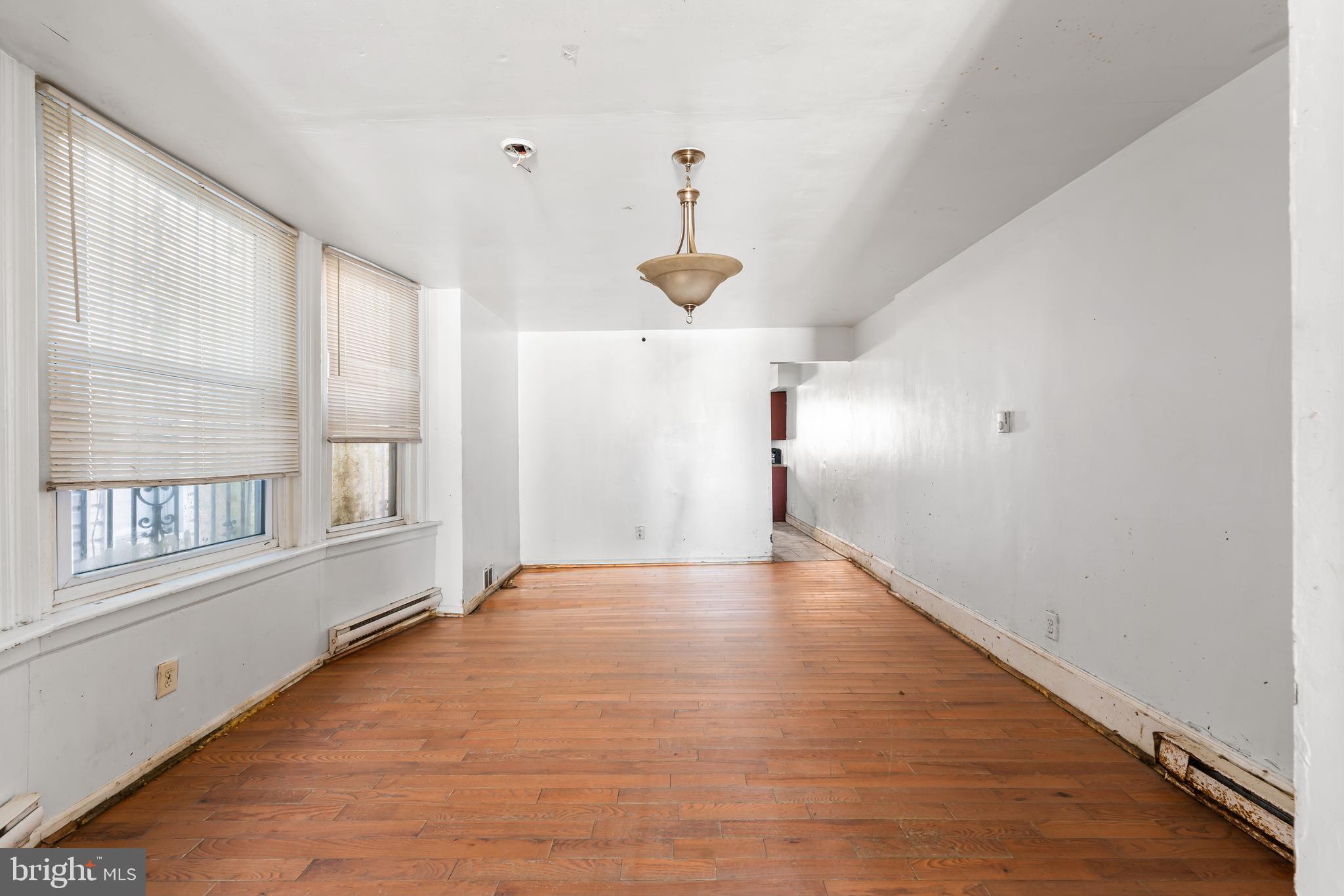 5215 Chester Avenue Philadelphia, PA 19143 - Photo 4 of 19 a view of an empty room with a window