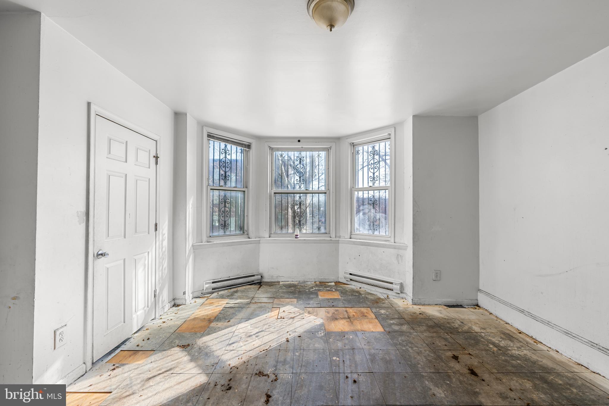 5215 Chester Avenue Philadelphia, PA 19143 - Photo 7 of 19 an empty room with windows