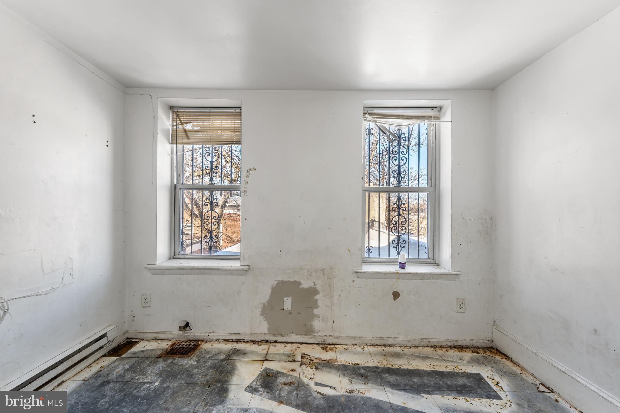 5215 Chester Avenue Philadelphia, PA 19143 - Photo 10 of 19 an empty room with windows