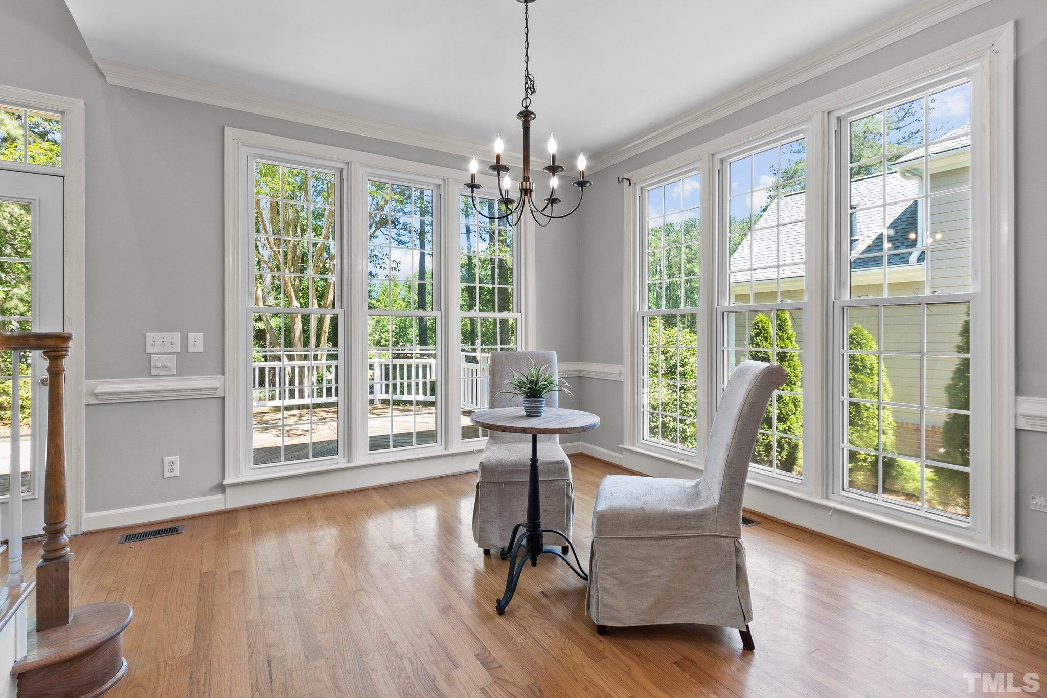 269 Hogans Valley Way Cary, NC 27513 - Photo 15 of 42 a view of a livingroom with furniture wooden floor and windows