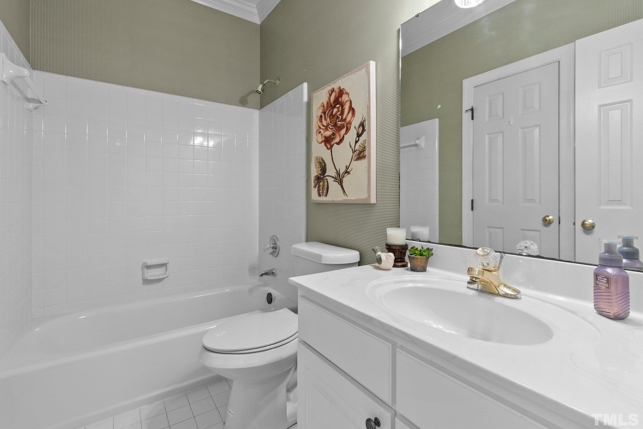 269 Hogans Valley Way Cary, NC 27513 - Photo 23 of 42 a bathroom with a sink toilet and shower