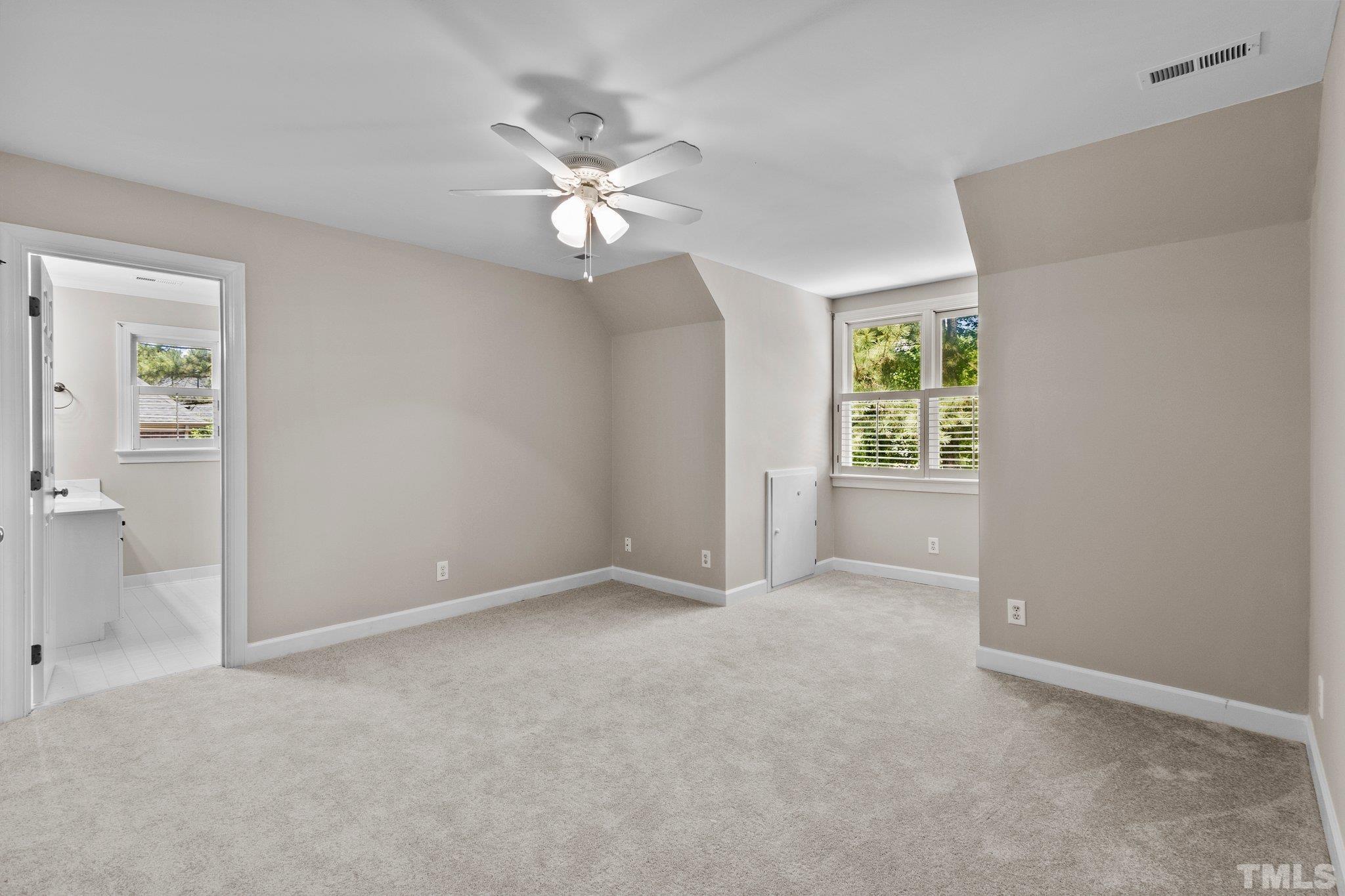 269 Hogans Valley Way Cary, NC 27513 - Photo 26 of 42 an empty room with windows and closet